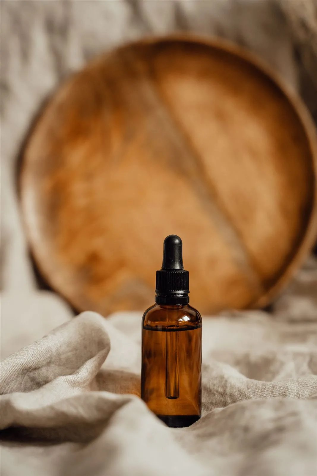 Vitamin C serum dropper bottle with citrus slices